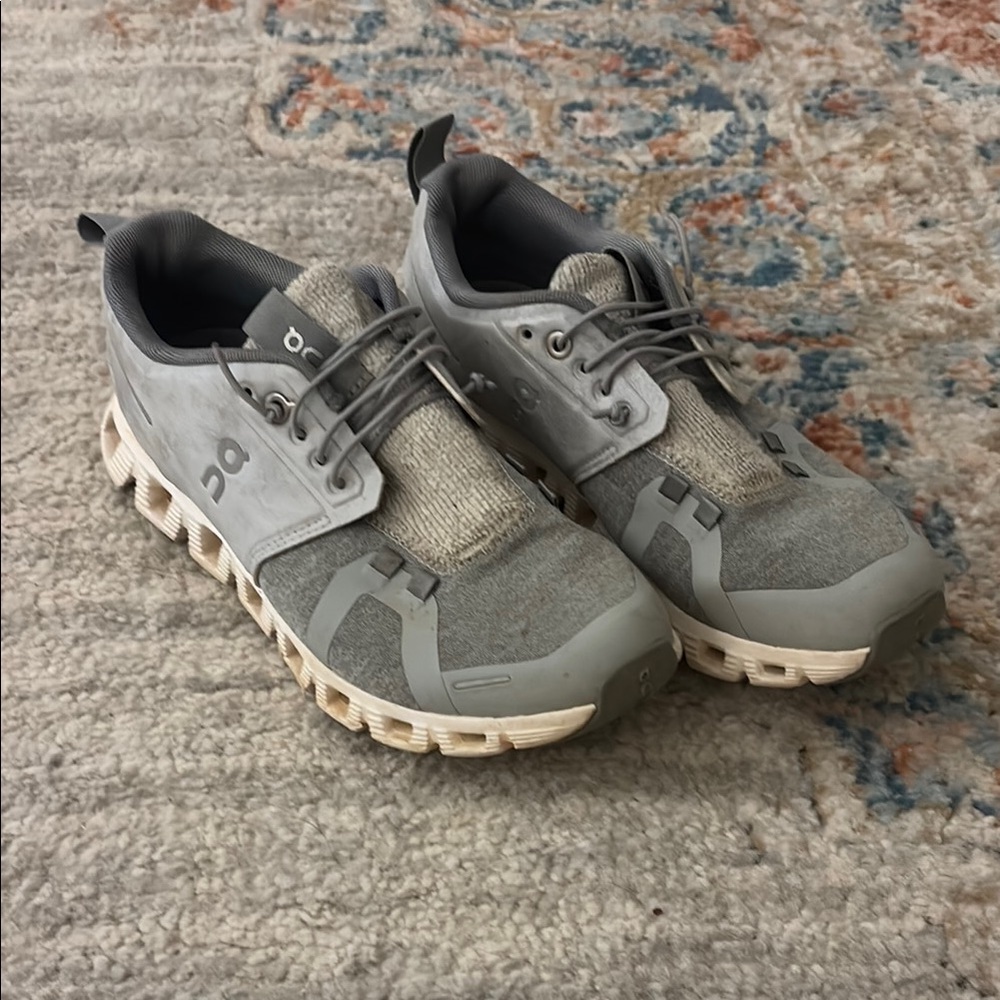 On Running Gray Sneakers with Cloud-Inspired Sole